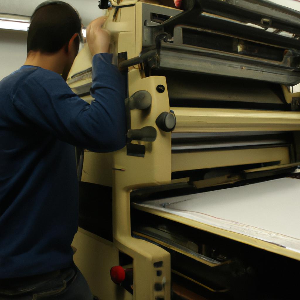 Person working at printing press