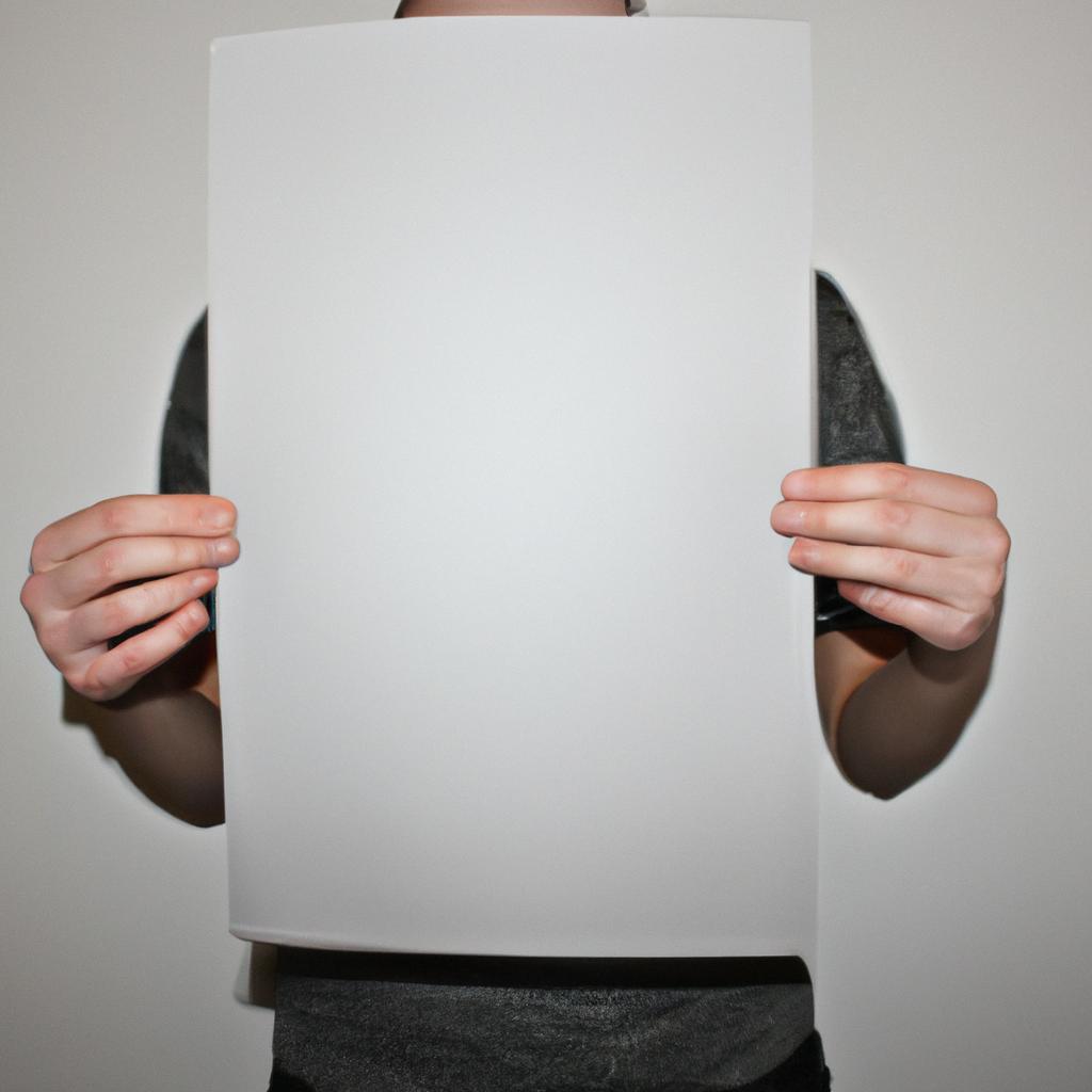 Person holding a printed advertisement